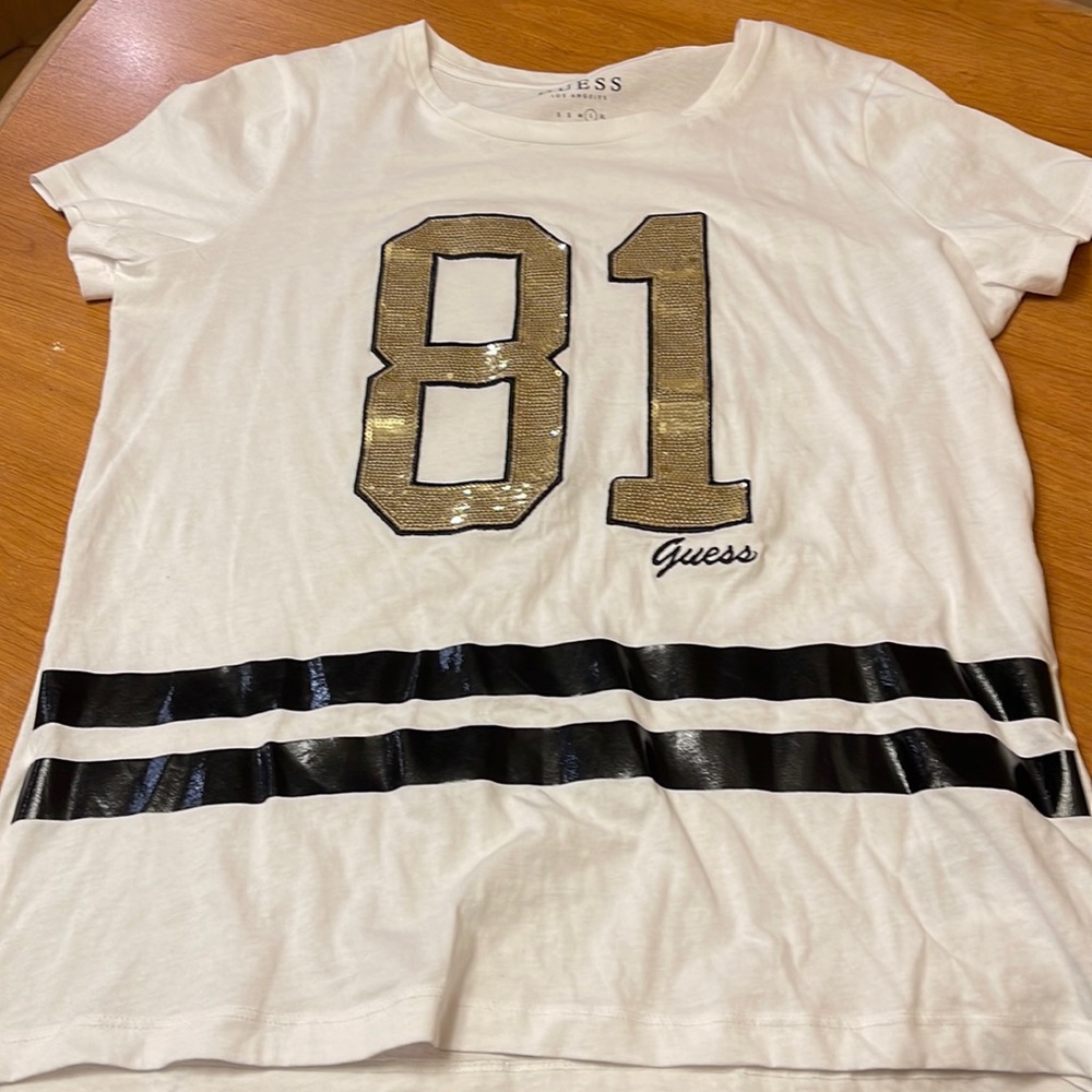 Womens Guess shirt with sequin number for very stylish look.